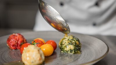 Knödel Tris – a gem of Tyrolean cuisine, prepared by the Biohotel Leutascherhof hiking hotel.© David Johansson