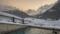 Berghotel Sexten WinterThe open swimmingpool and the Dolomites of Sesto at Berghotel in Sesto