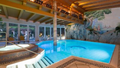 La piscina coperta di Filzmoss dell'Hotel Naturglück Alpenhof promette ore di divertimento per grandi e piccini.© Fotodesign David