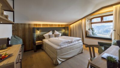 Le camere dell'Hotel Alpendorf sono ricche di fascino e bellezza.© Oczlon