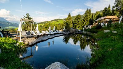 Schwimmteich im großzügigen AussenbereichNatur- und Wellnesshotel Höflehner Steiermark, Österreich;