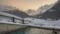 Blick auf den Pool im WinterThe open swimmingpool and the Dolomites of Sesto at Berghotel in Sesto