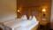 Zimmer mit Holz im Hotel Alte PostHotel Alte Post: Zimmer mit Holz