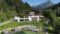 Der sommerliche Naturbadeteich des Wanderhotel Landhotel Alpenhof in Filzmoos in Österreich aus der Vogelperspektive.