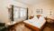 Die geräumigen Zimmer im Ski- und Wanderhotel Steffner-Wallner sind perfekt für einen Winterurlaub in Mauterndorf.© KWER