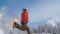 Mann springt mit den Schneeschuhen in eine Winterlandschaft(c)TVB Tux Finkenberg